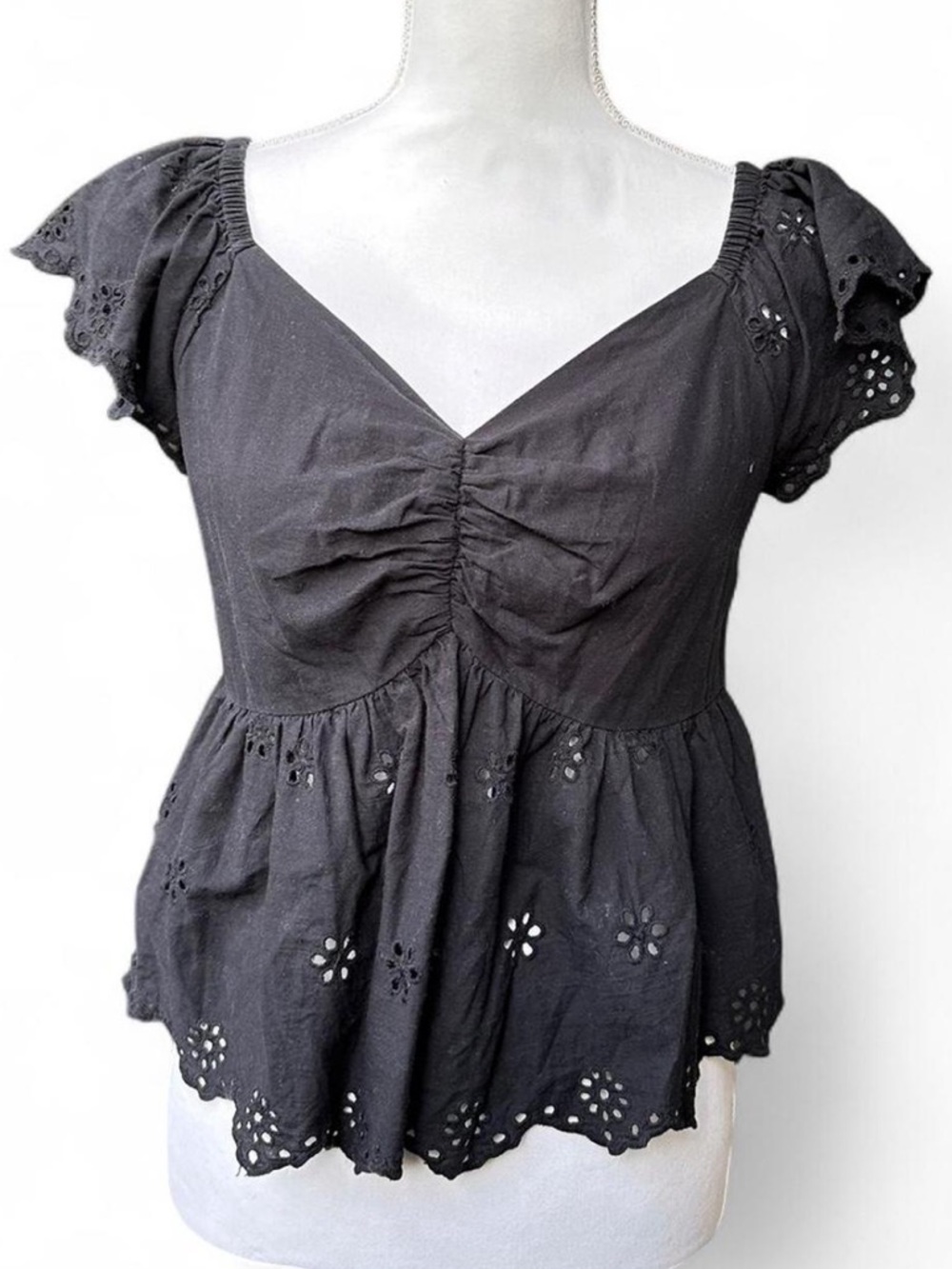 Black Eyelet Ruched Peplum Top